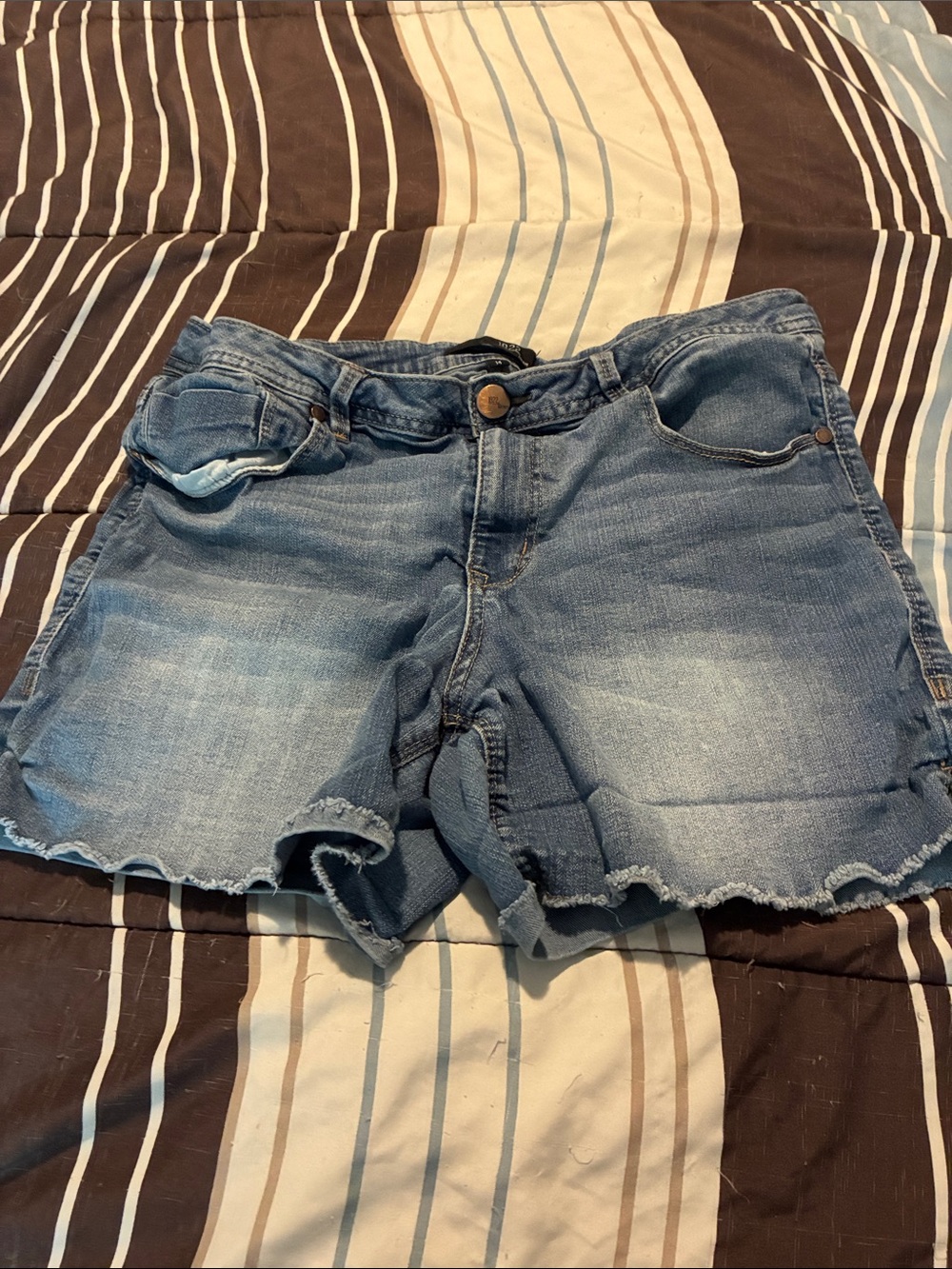 Women’s Distressed Light Blue Denim Cutoff Shorts